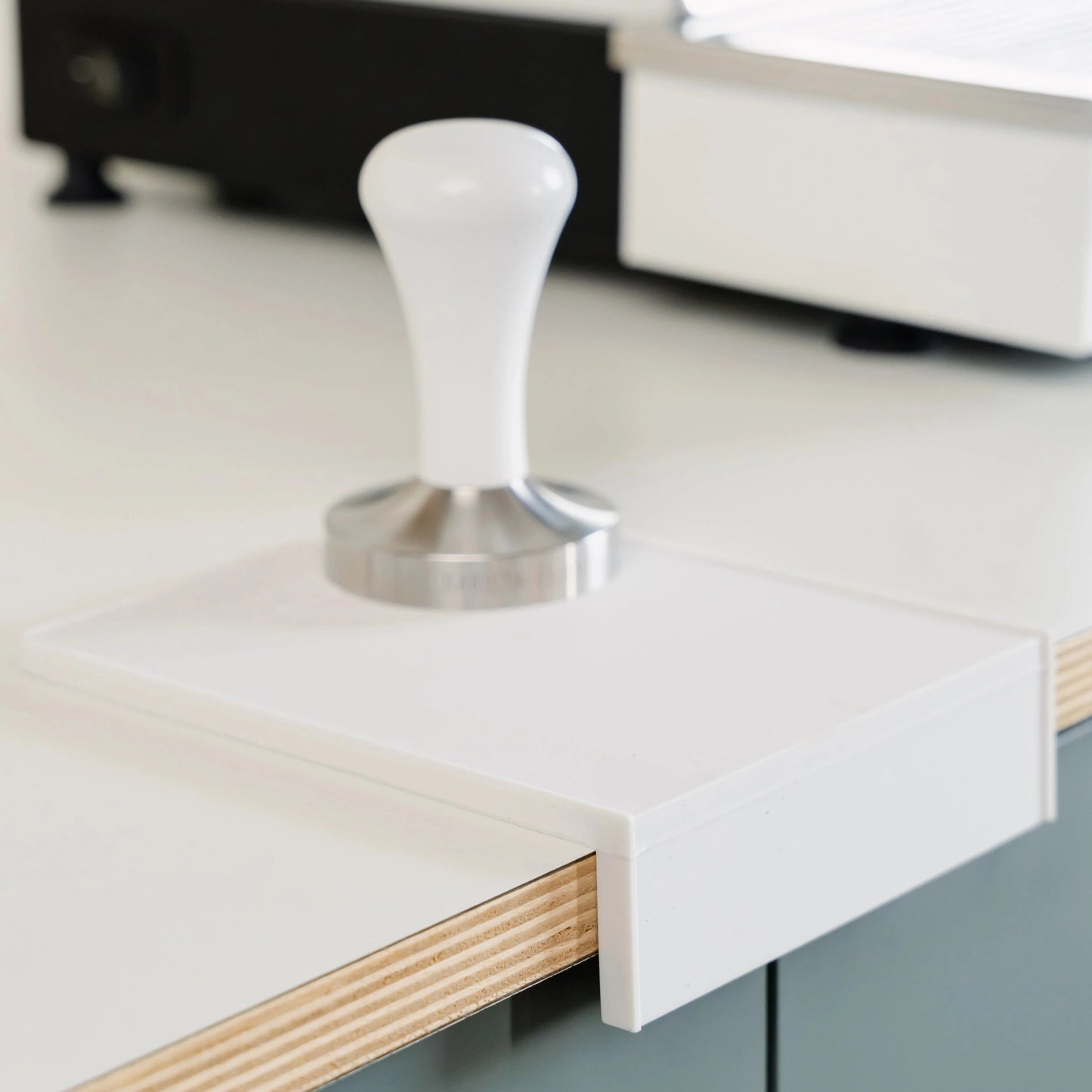 https://cdn.shopify.com/s/files/1/0920/8548/5951/files/Tamping_mat_corner_small_white_04.webp?v=1760101323